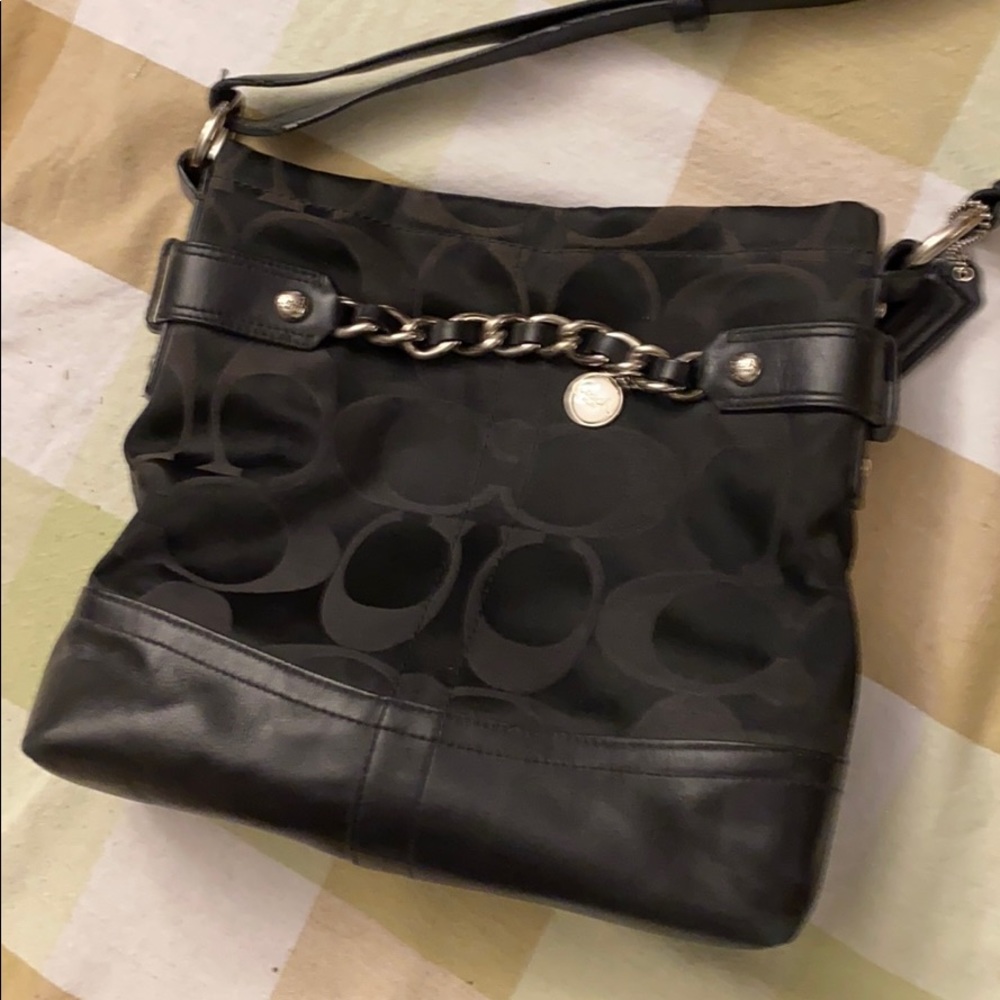 Never used.  Coach purse.  Excellent condition.